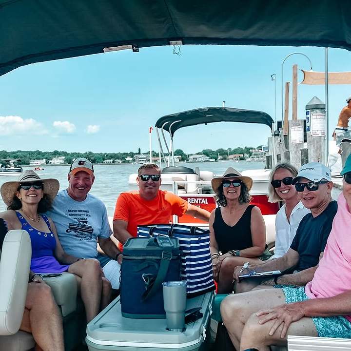 Family enjoying a pontoon boat rental in Rehoboth at dewey beach watersports