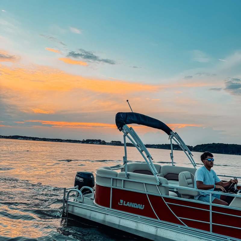 Aidan Montgomery at Dewey Beach Waterports on a pontoon boat rental